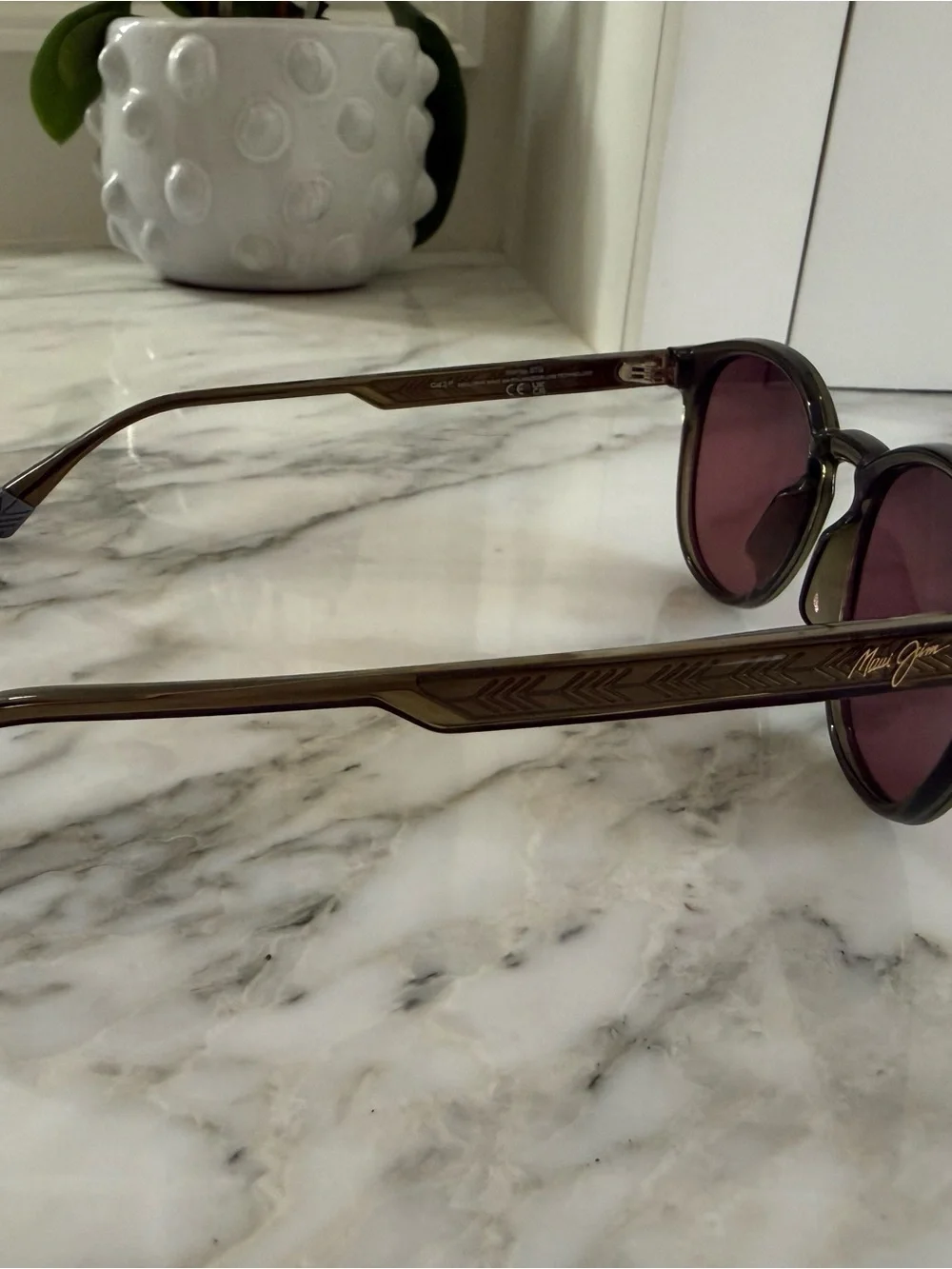 Maui Jim shiny trans green frame with Maui rose frame - polarized